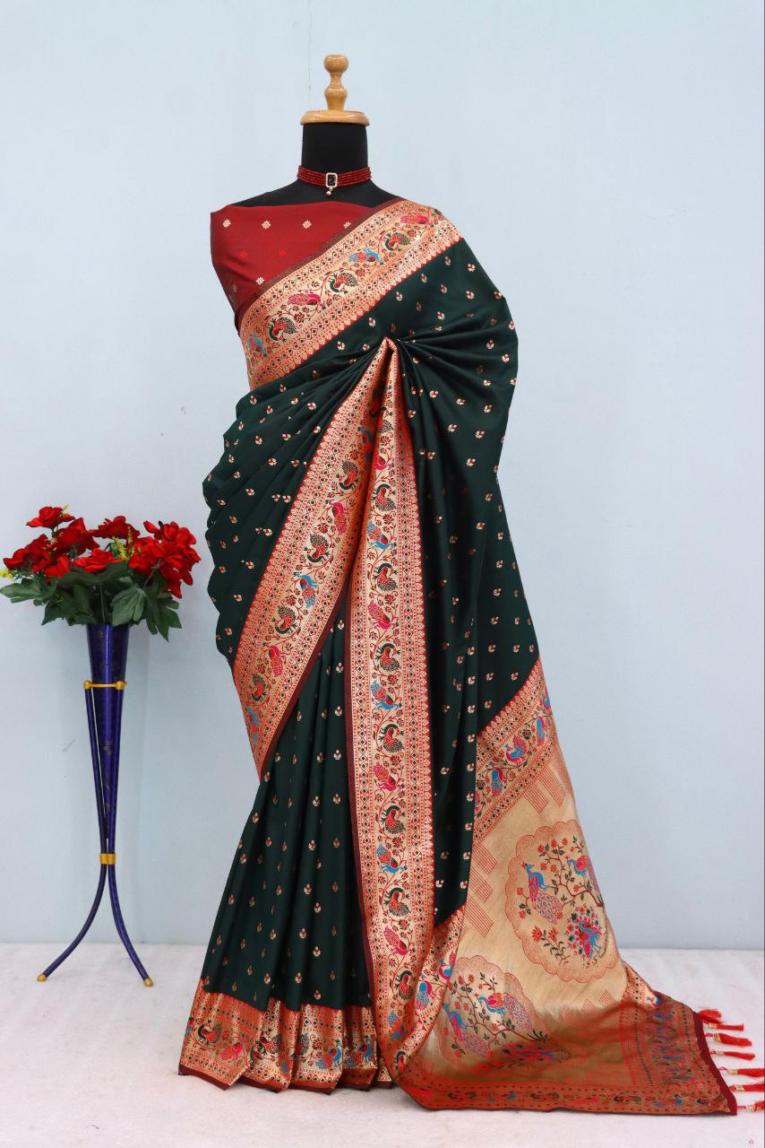 Has floral and peacock motifs on the zari border and pallu - DARK GREEN