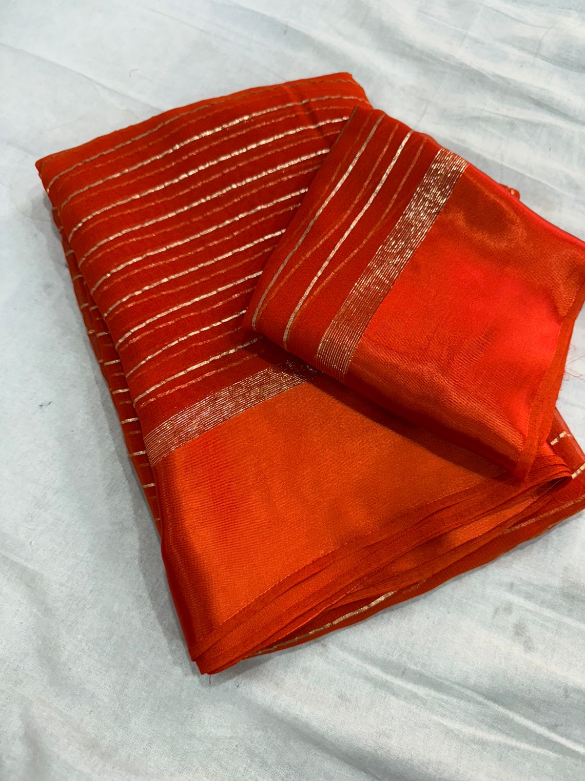 Elegant Orange Viscose Georgette Saree with Satin Patti Border & Running Blouse
