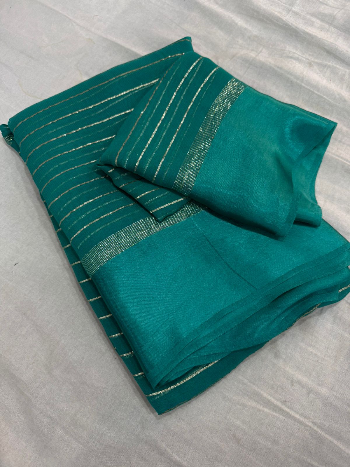 Elegant Rama Viscose Georgette Saree with Satin Patti Border & Running Blouse