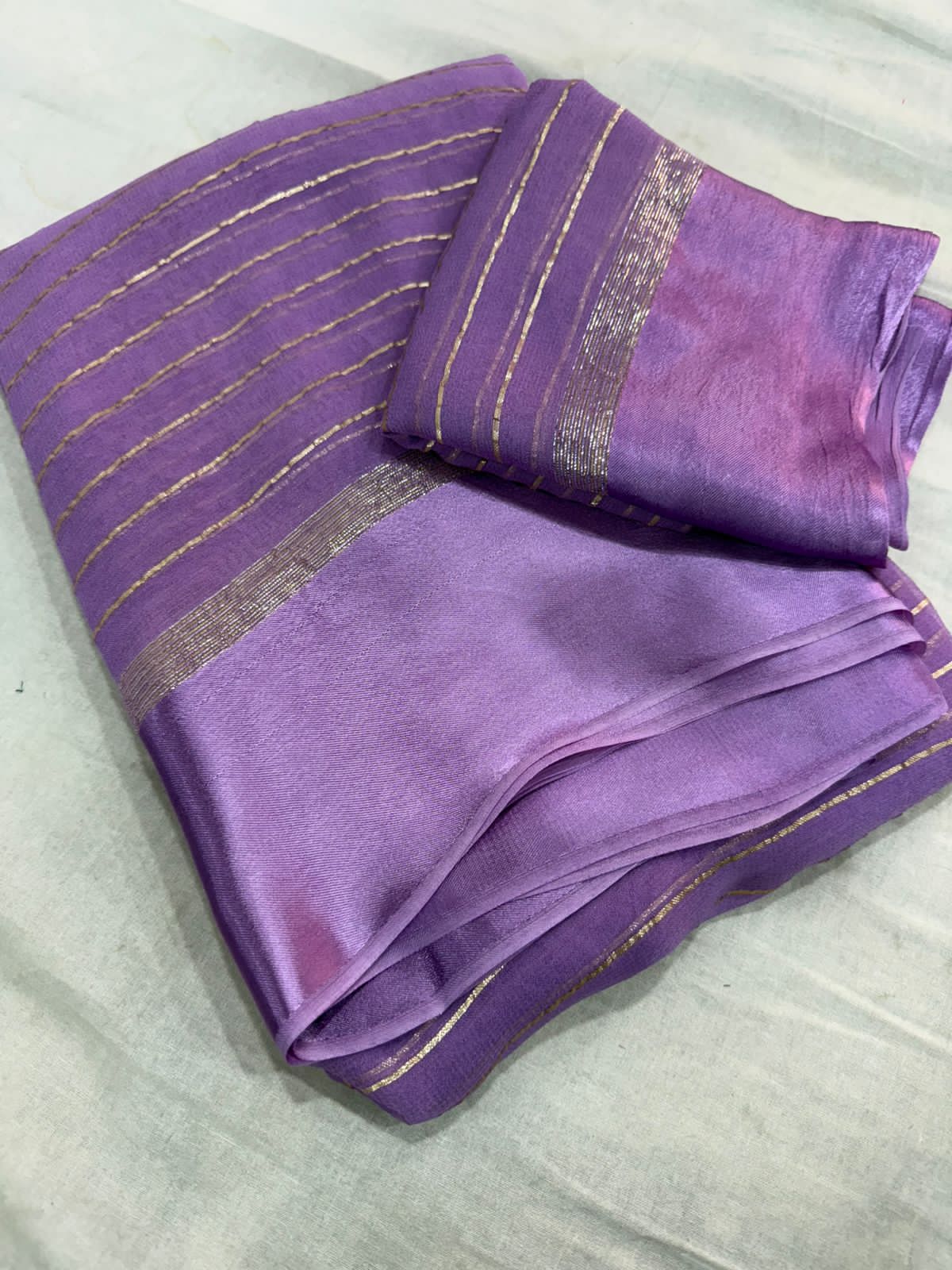 Elegant light Purple Viscose Georgette Saree with Satin Patti Border & Running Blouse