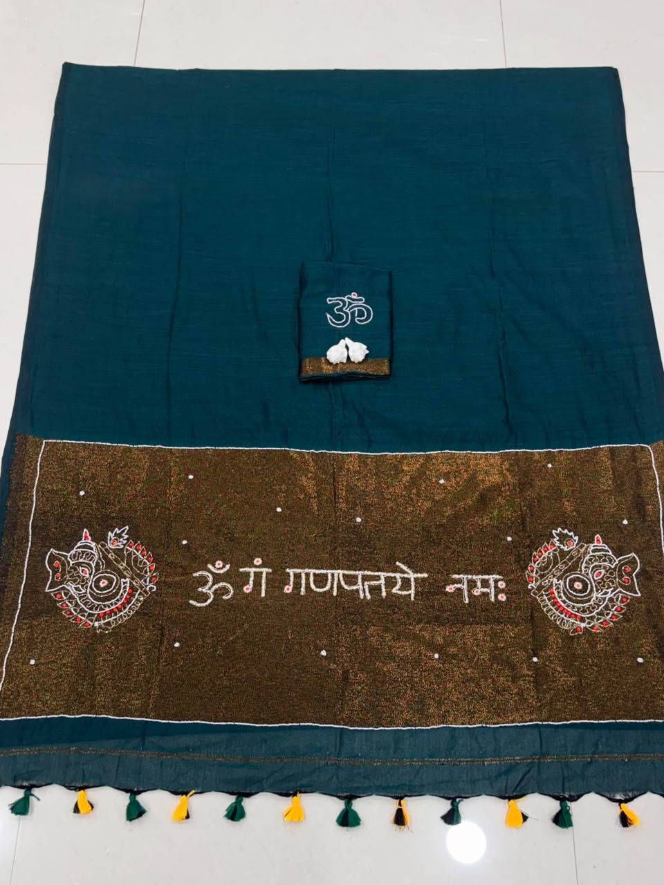 Premium Handcrafted Om Ganpati Embroidery Saree with Zari Border & Designer Tassels-  RAMA